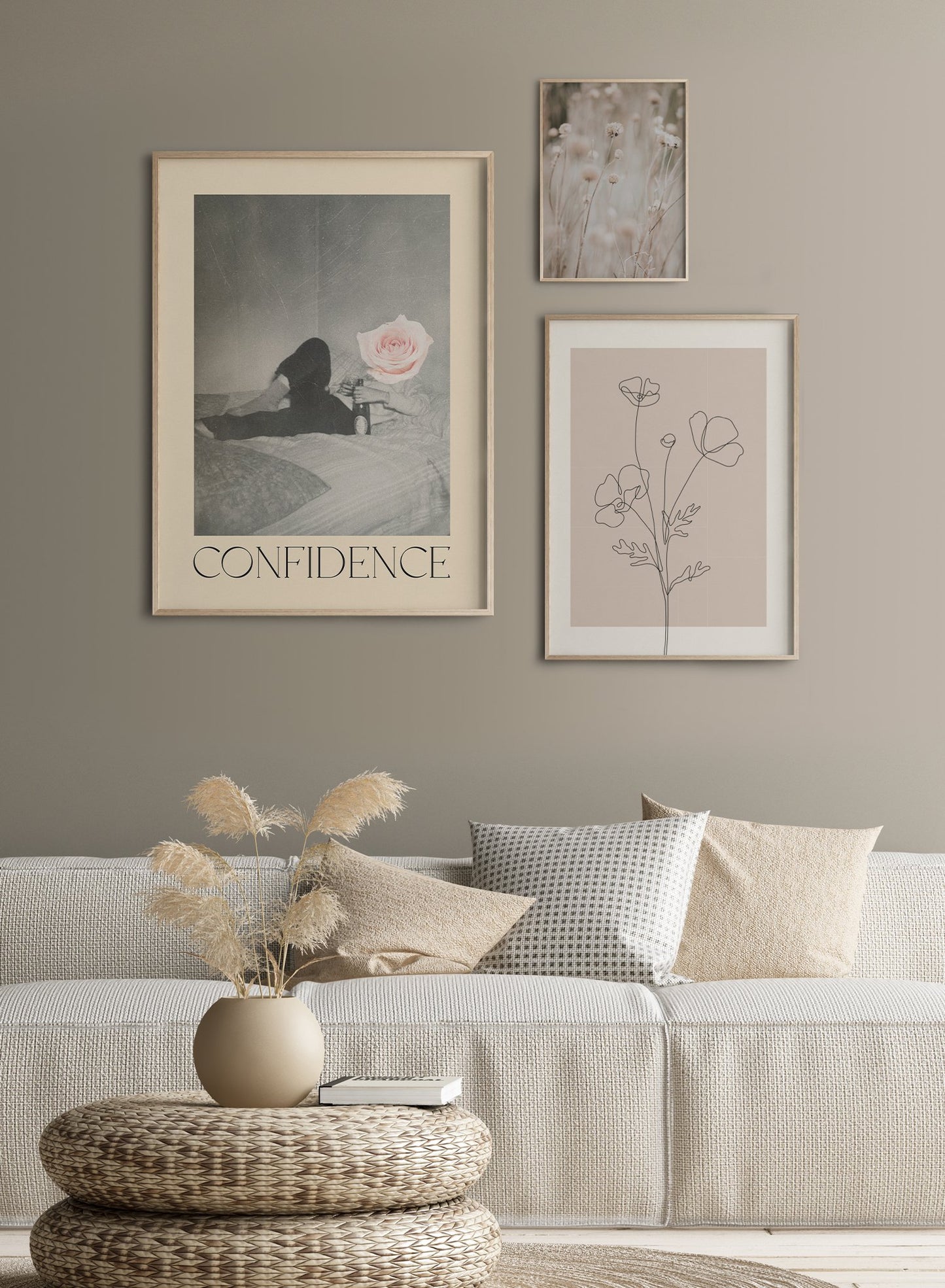 "Confidence" is a minimalist beige and black & white typography collage poster by Opposite Wall of a cutout vintage man lying in bed with wine and a pink rose and the word ‘confidence’ in vintage letters.