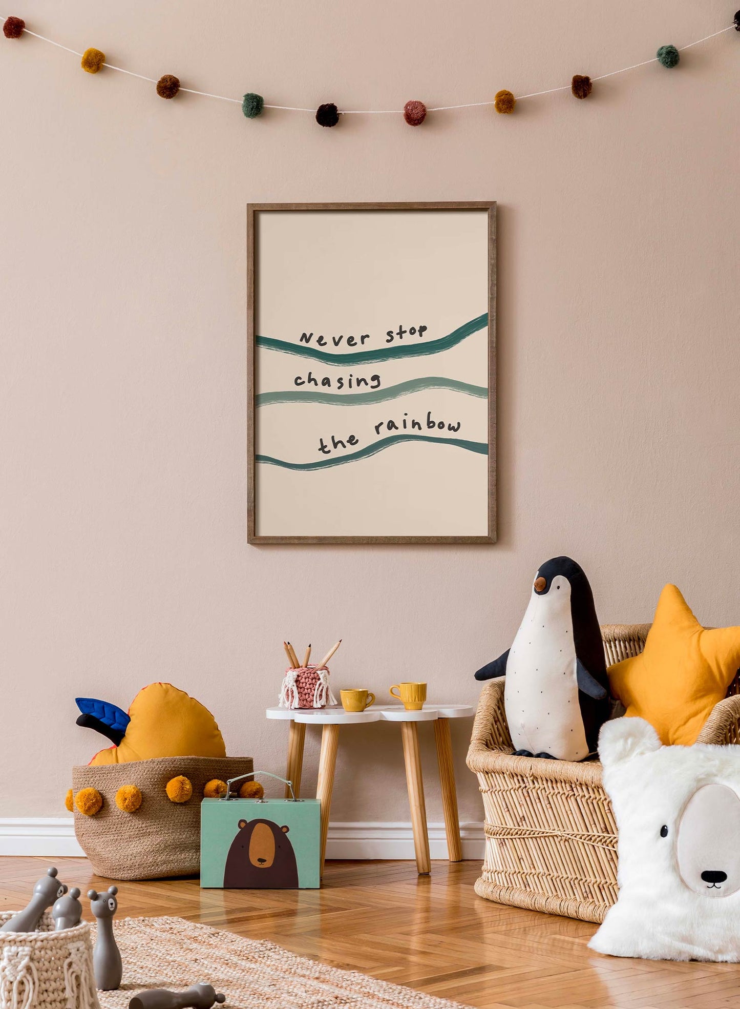 Chasing Rainbows is a minimalist typography by Opposite Wall of the words "Never stop chasing the rainbow" written over squiggly lines.