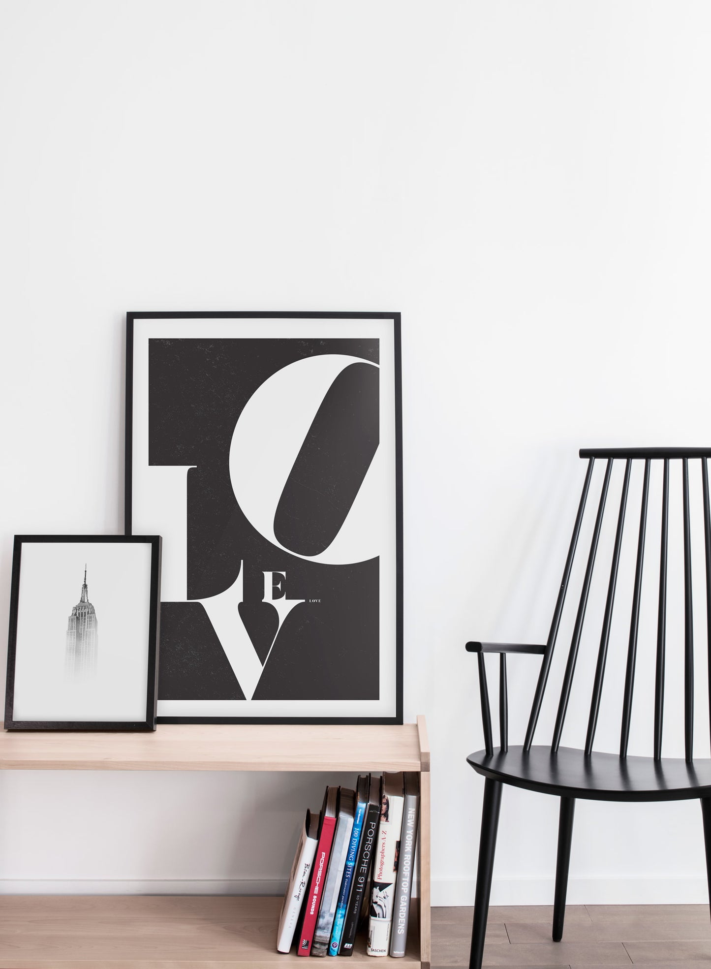 Scandinavian poster by Opposite Wall with trendy black and white Love typo design - Living room with a black chair
