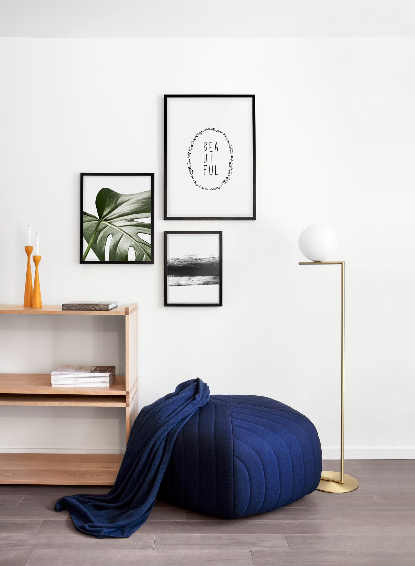 Scandinavian art print by Opposite Wall with Widespread Wonder art photo of Monstera leaf - Living room with a pouf