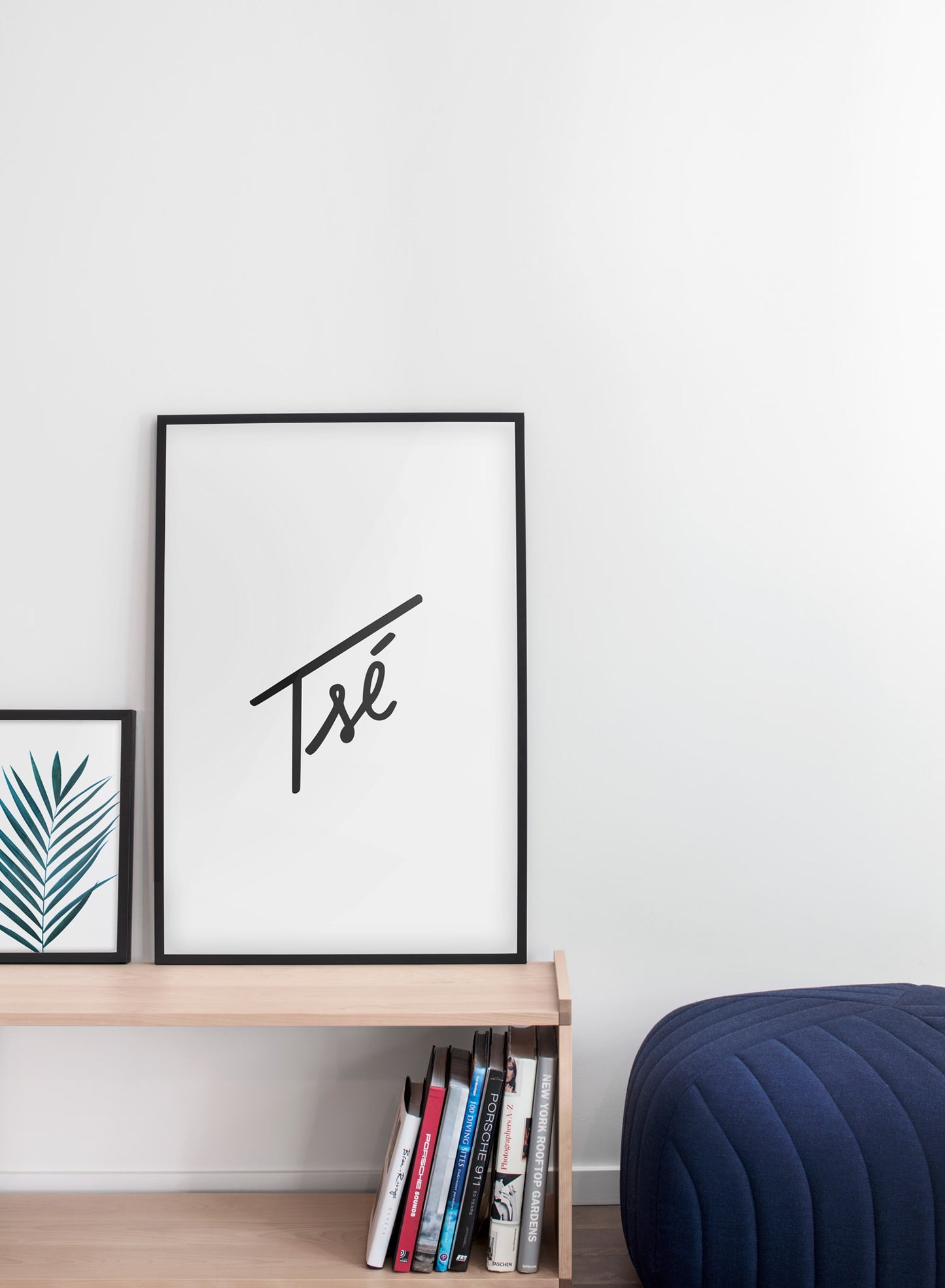 Modern minimalist poster by Opposite Wall with with Quebec expression Tsé typography design - Living room with a pouf