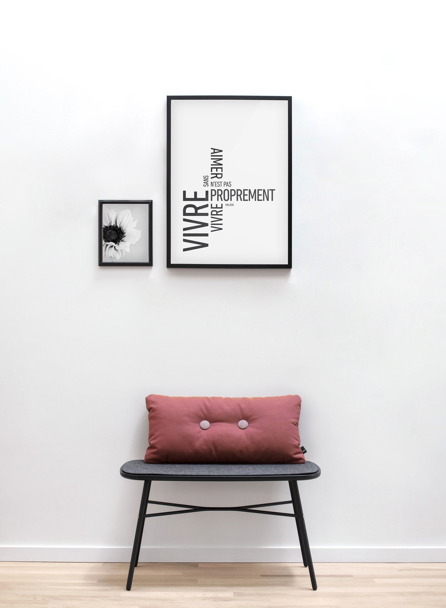 Scandinavian art print by Opposite Wall with modern black and white Loving graphic typography design - with Molière quote - Living room with a rasberry cushion