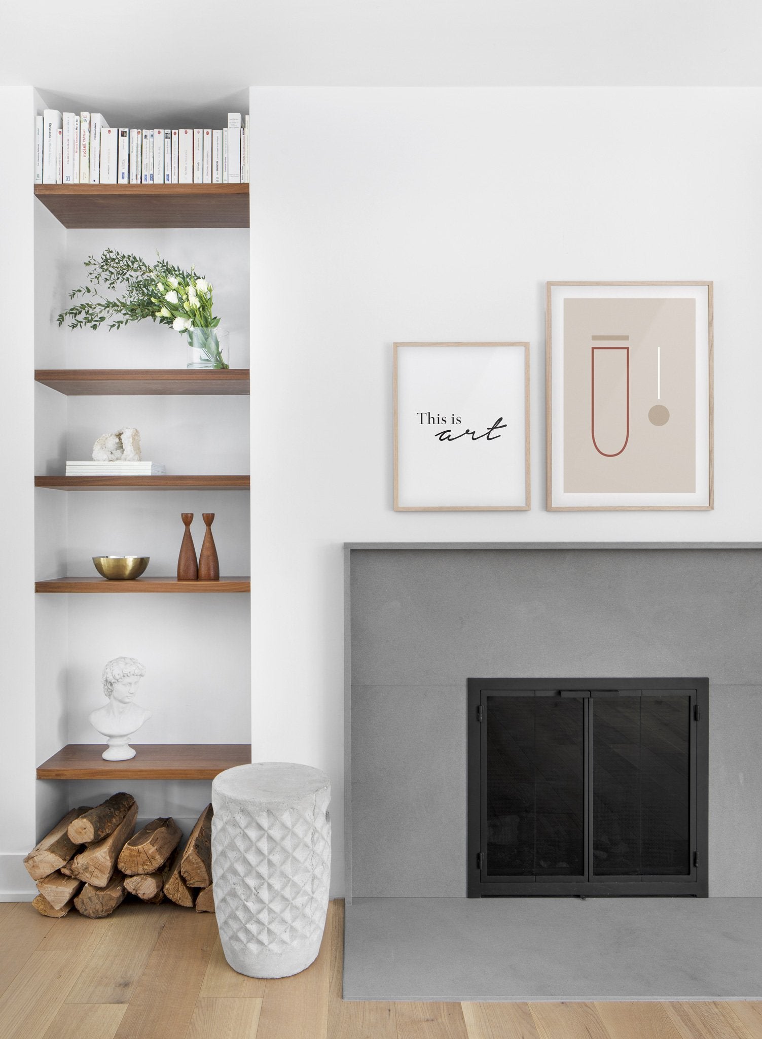Scandinavian poster by Opposite Wall with black and white graphic typography design of this is art - Living room with a fireplace