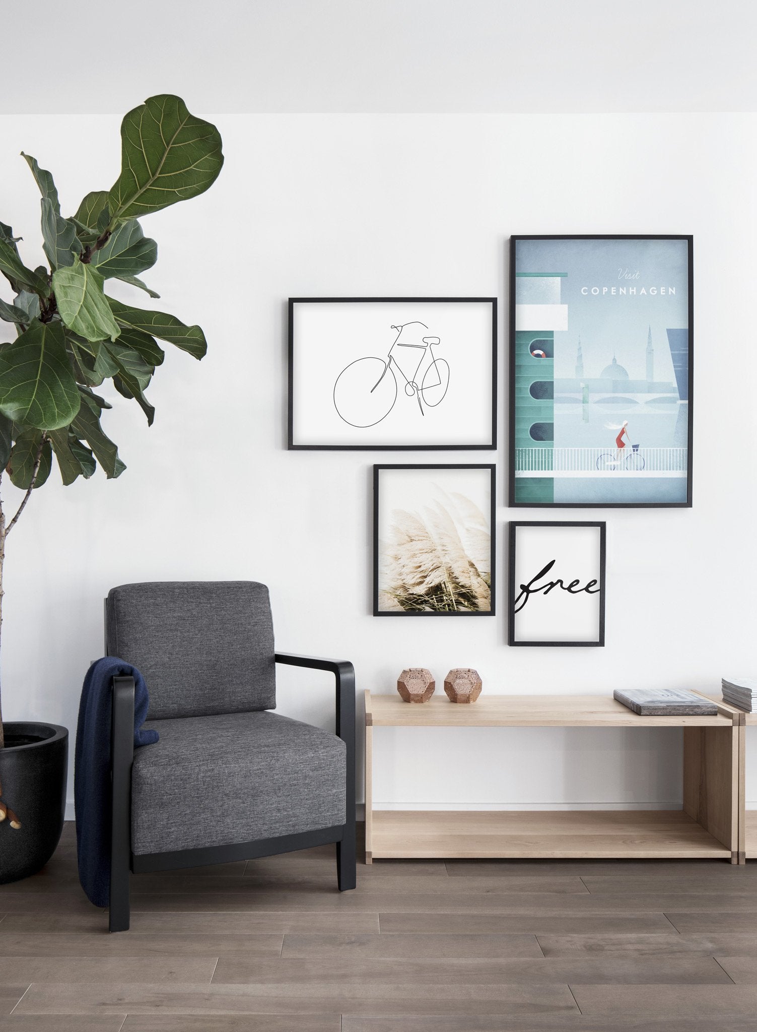 Modern minimalist poster by Opposite Wall with poster trio of illustration of Canada - EntrywayModern minimalist poster by Opposite Wall with poster trio of illustration of CanaModern minimalist poster by Opposite Wall with poster quad of illustration of Copenhagen, Denmark - Living Room