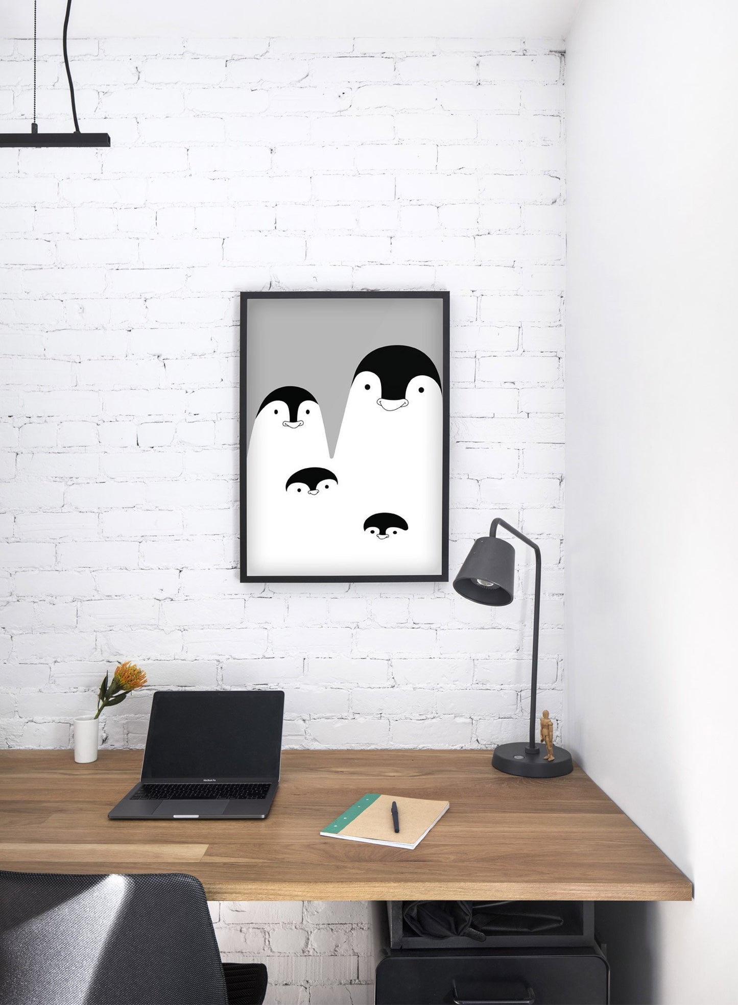 Modern minimalist poster by Opposite Wall with an illustration of a penguin family in black and white - kids collection - office desk