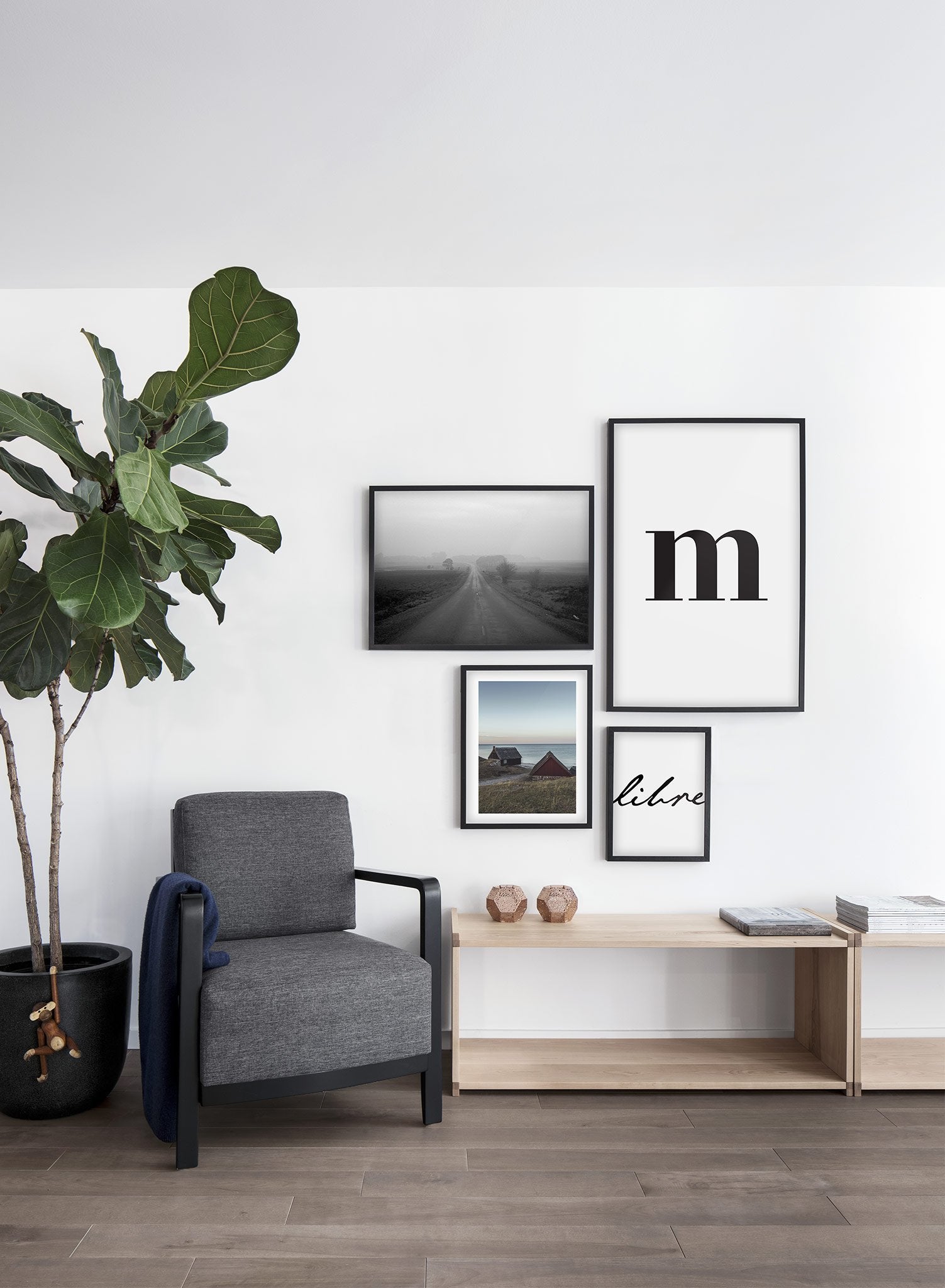 Scandinavian poster by Opposite Wall with black and white graphic typography design of lowercase letter M - Living Room - Gallery Wall Quad