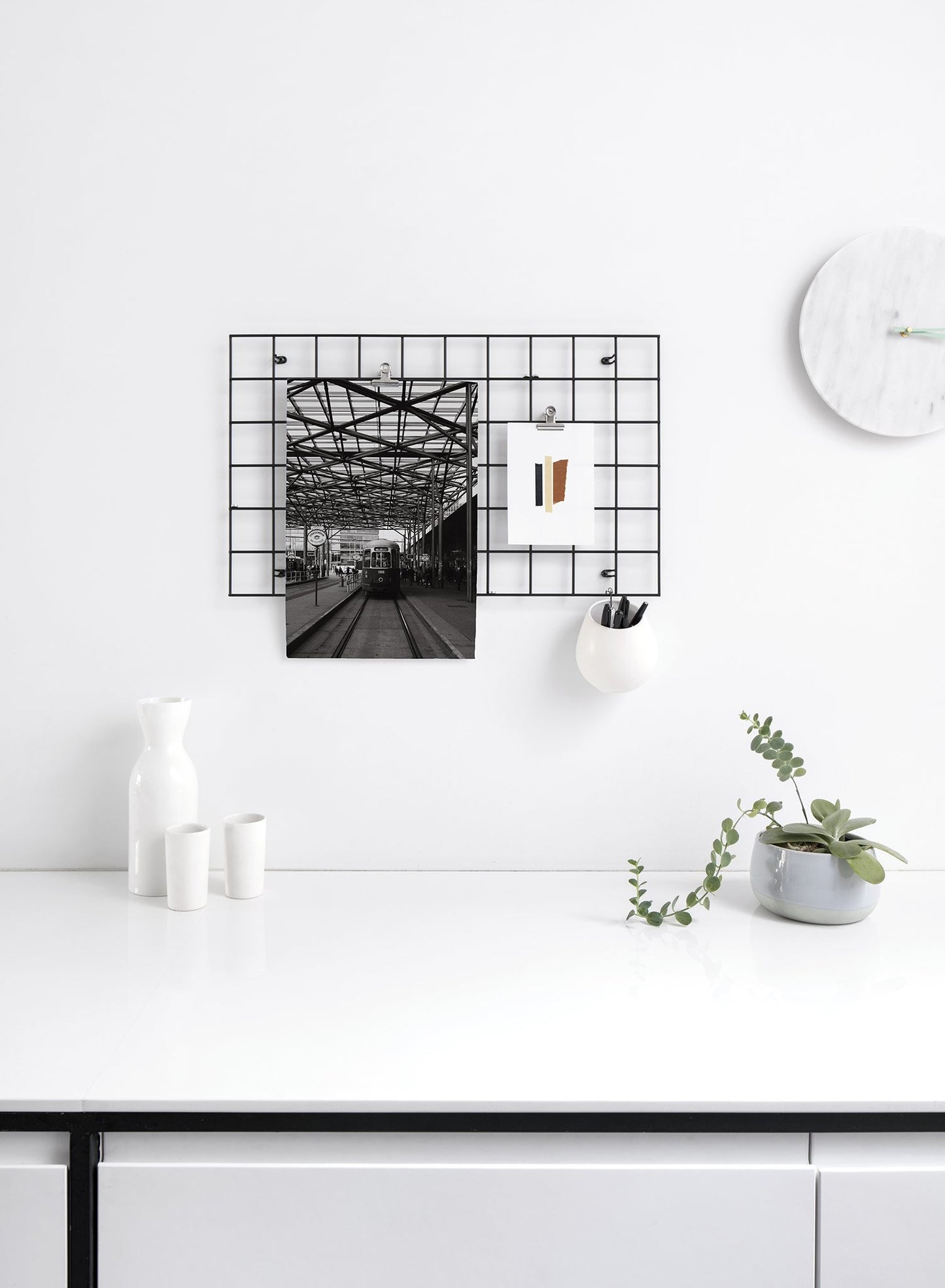 Modern minimalist poster by Opposite Wall with black and white photography of train station - Lifestyle Duo - Office Desk