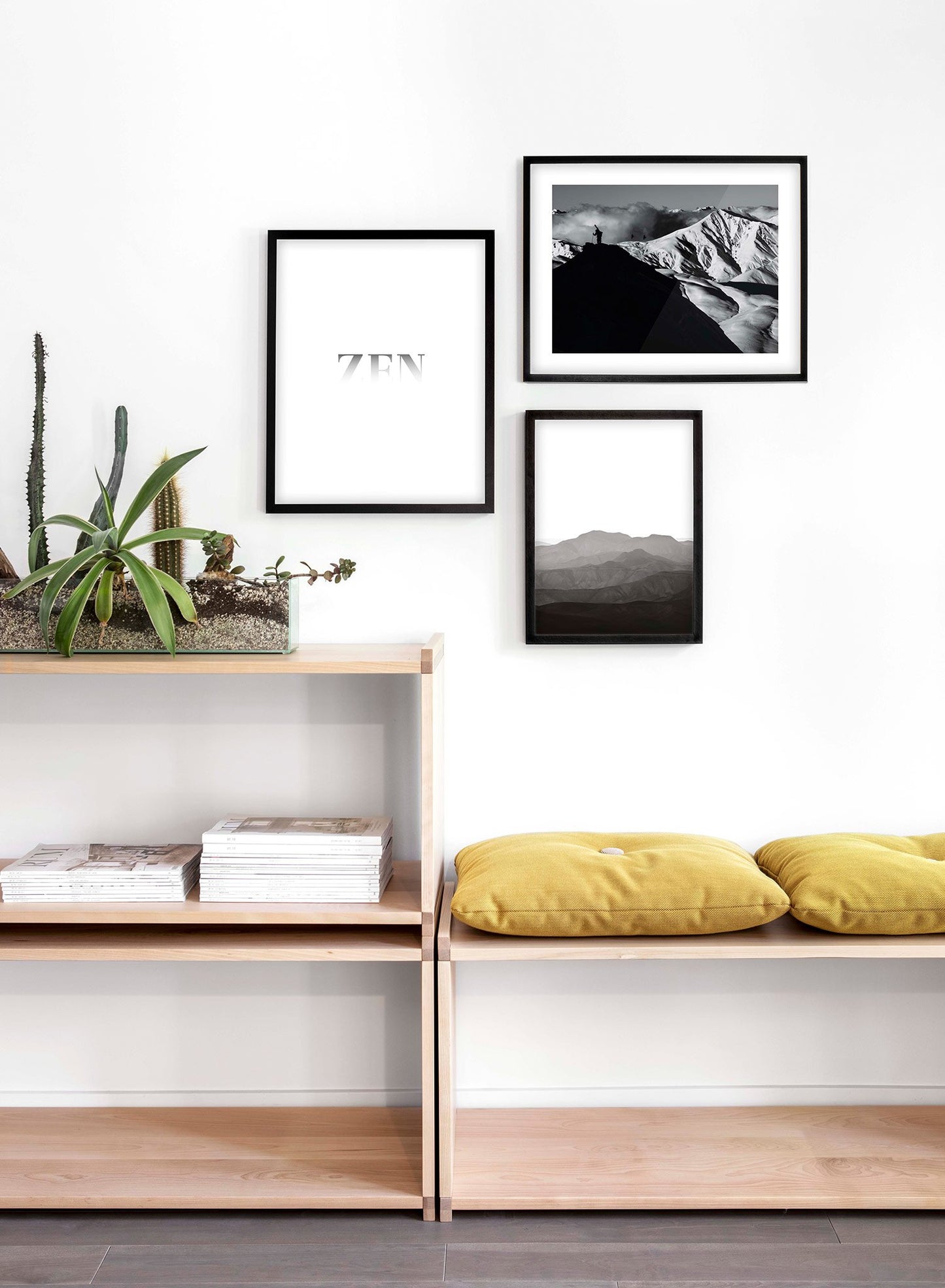Landscape photography poster by Opposite Wall with hiker standing on top of mountain - Lifestyle Trio - Living Room
