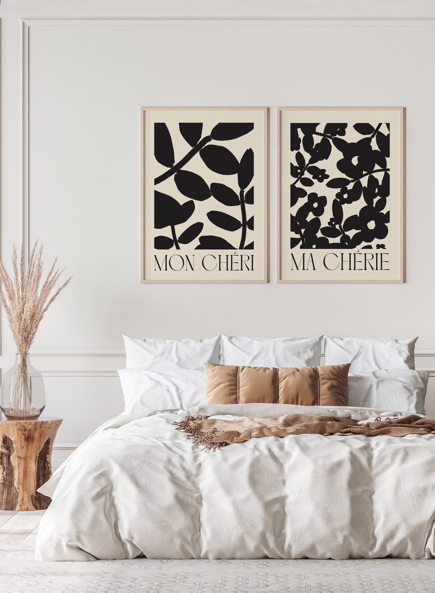 "Mon Cheri" is a minimalist illustration poster by Opposite Wall in beige and black of an abstract botanical pattern and the words ‘my darling’ in French typography.