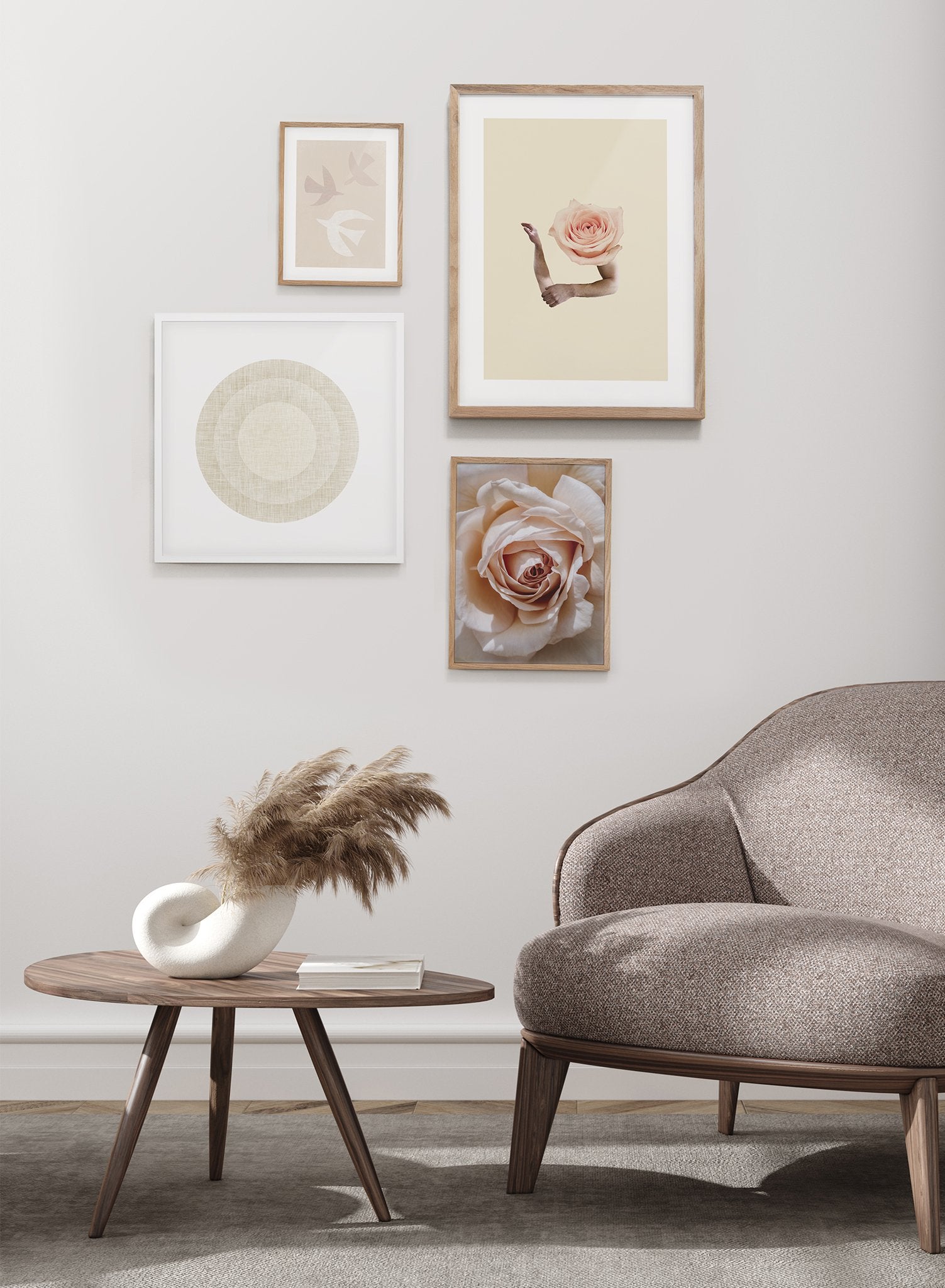 "Open Arms" is a minimalist beige and light pink collage poster by Opposite Wall of cutout arms and a baby pink rose layered over a beige background.
