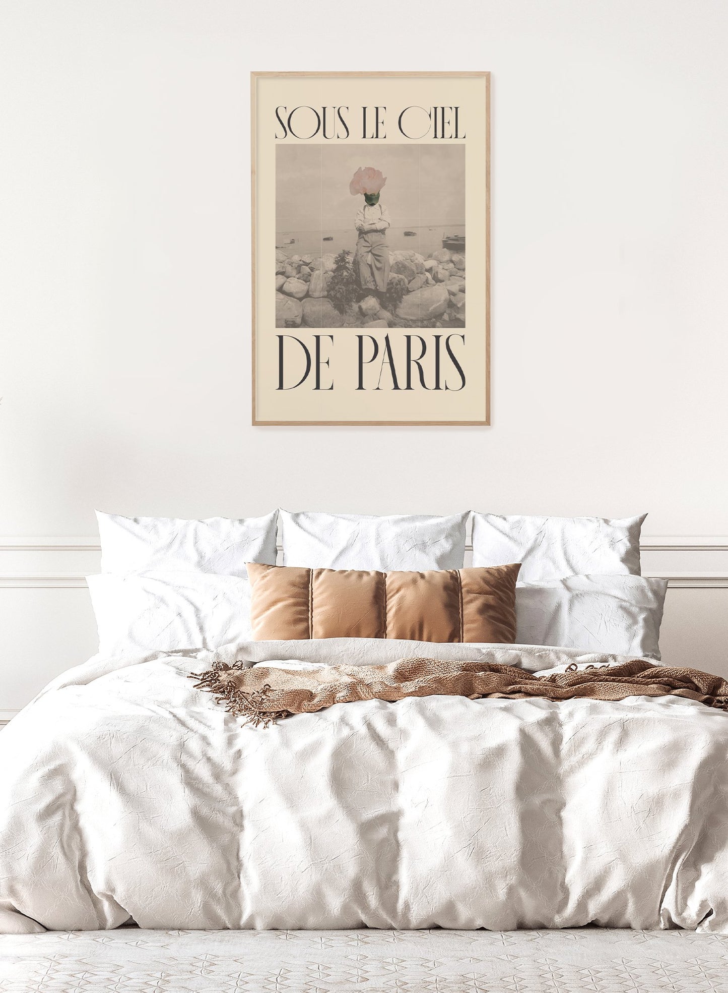 "Under the Paris Sky in Beige" is a minimalist beige collage poster by Opposite Wall of a deconstructed vintage photography of a man with a rose on his head and the words ‘under the paris sky’ in French.