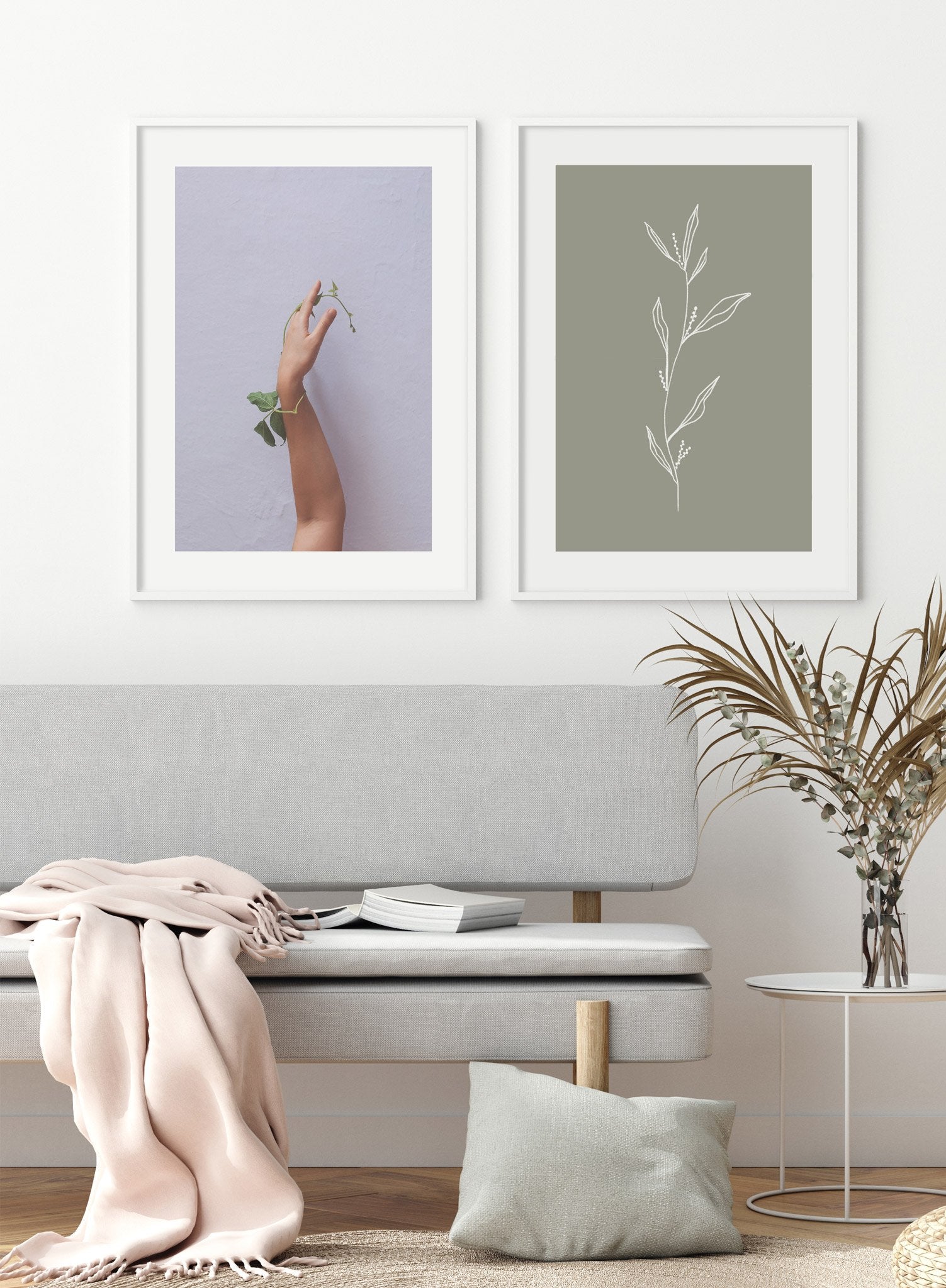 "Skin & Foliage" is a minimalist photography poster by Opposite Wall of a nude arm and hand entangled with a green leafy stem.