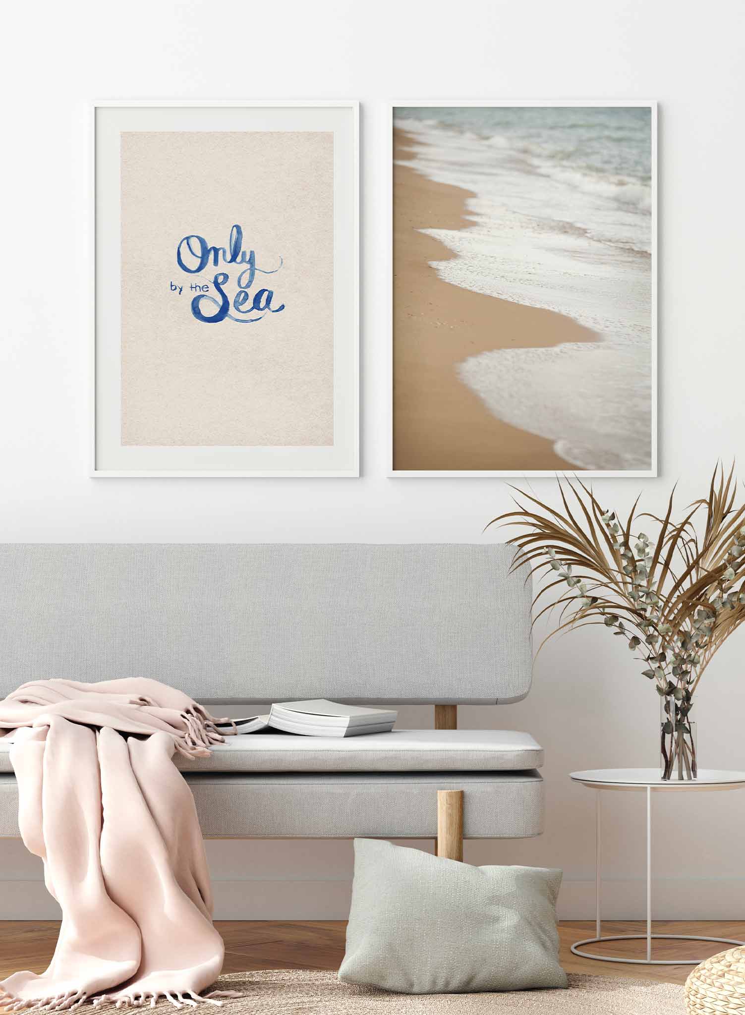 Seaside Living is a minimalist typography of the words 'Only by the sea' written in a calligraphy style by Opposite Wall.