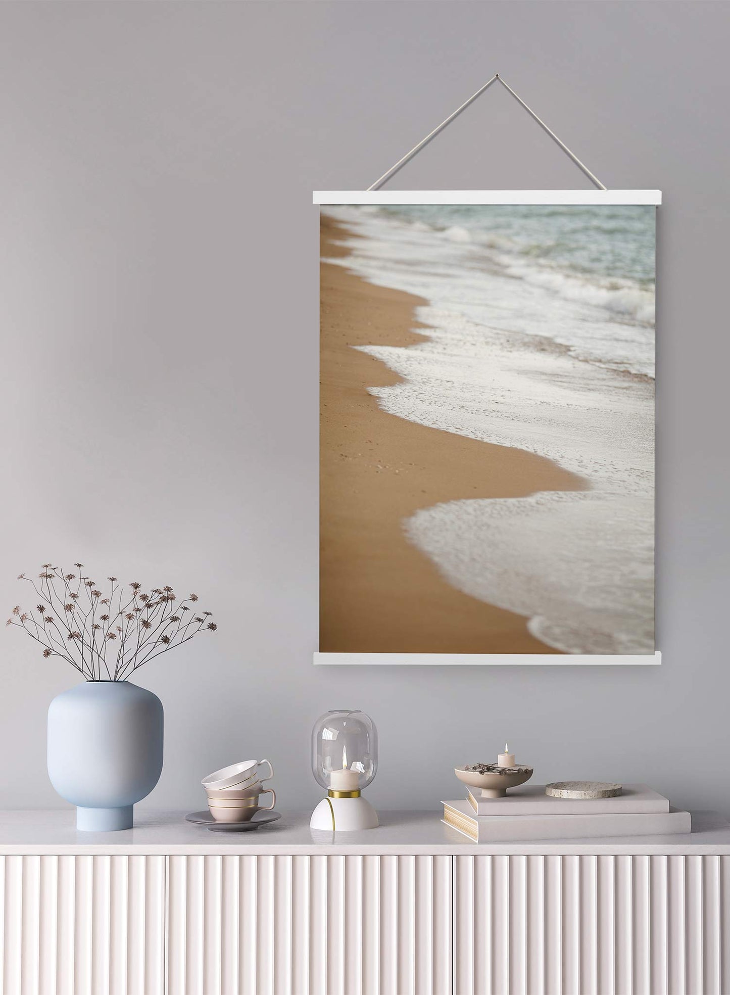 Ocean Tide is a minimalist photography of a calm wave crashing onto the shore of a beach by Opposite Wall.