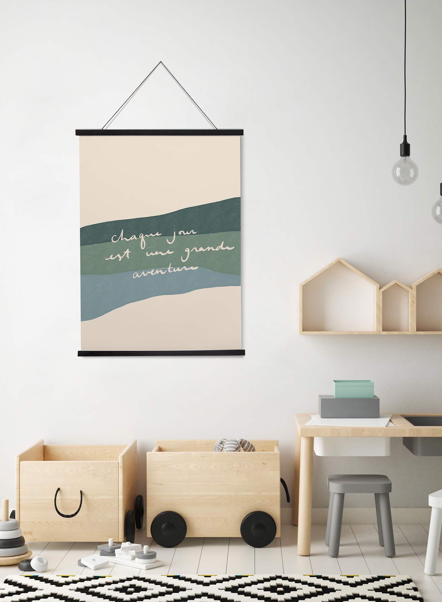Daily Adventure is a minimalist typography by Opposite Wall of the cursive words "Chaque jour est une grande aventure" in French layered over strokes of blue and green. 