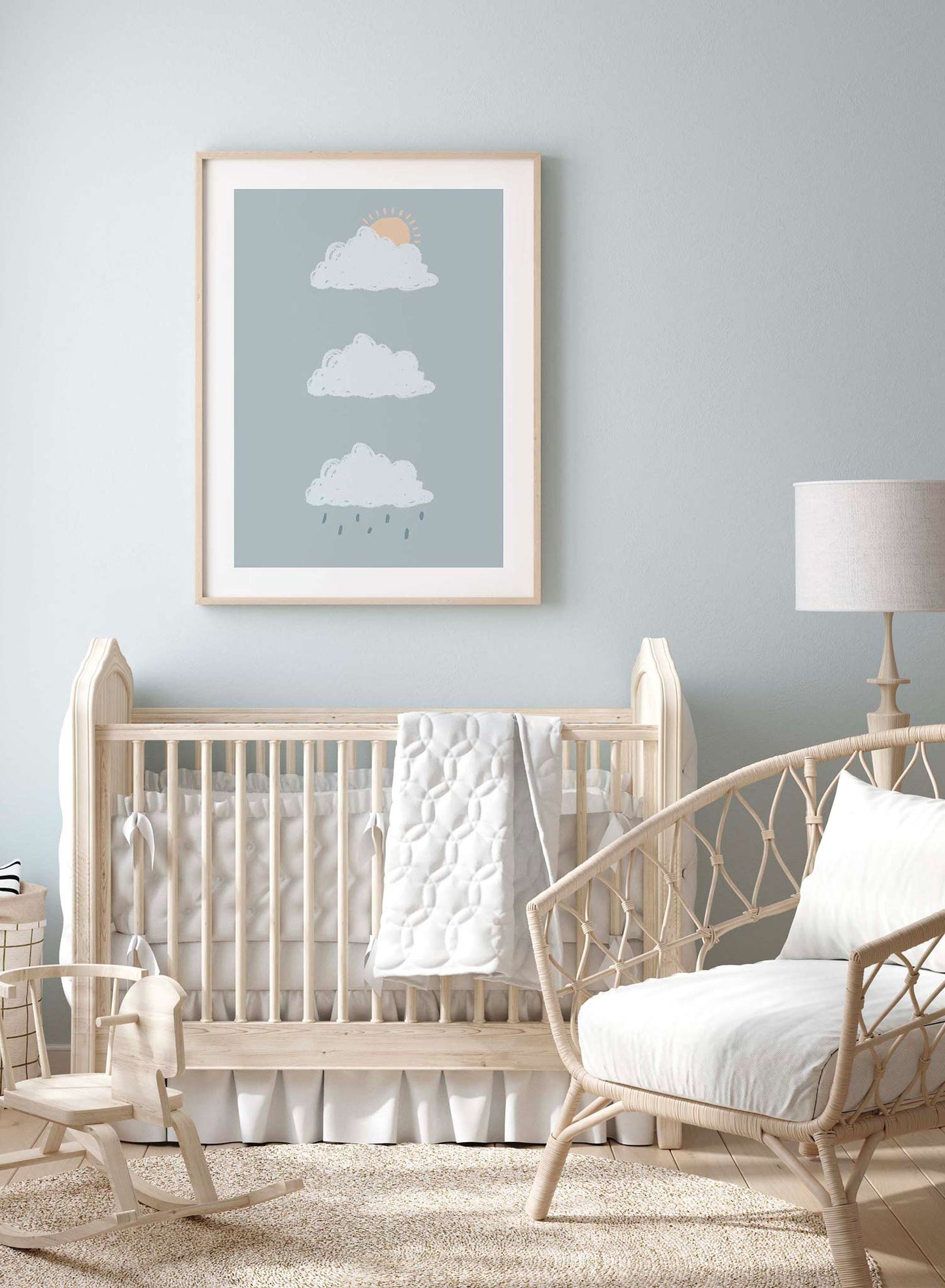 Moody Clouds is a minimalist illustration by Opposite Wall of three different cloud patterns: sunny, cloudy and rainy. 