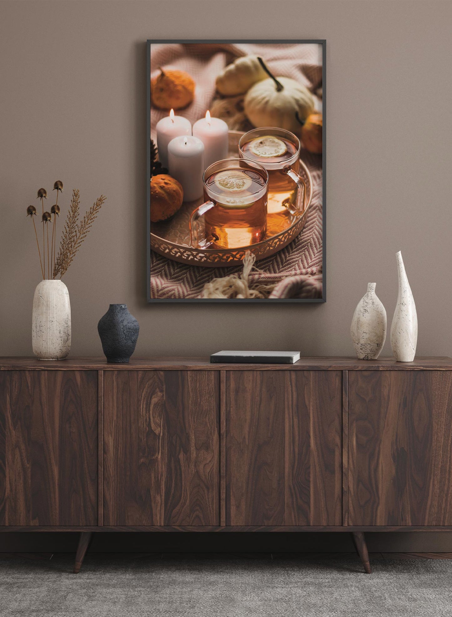 Hug in a Cup is a minimalist photography by Opposite Wall of two cups on lemon tea next to three candles with pumpkins in the background.