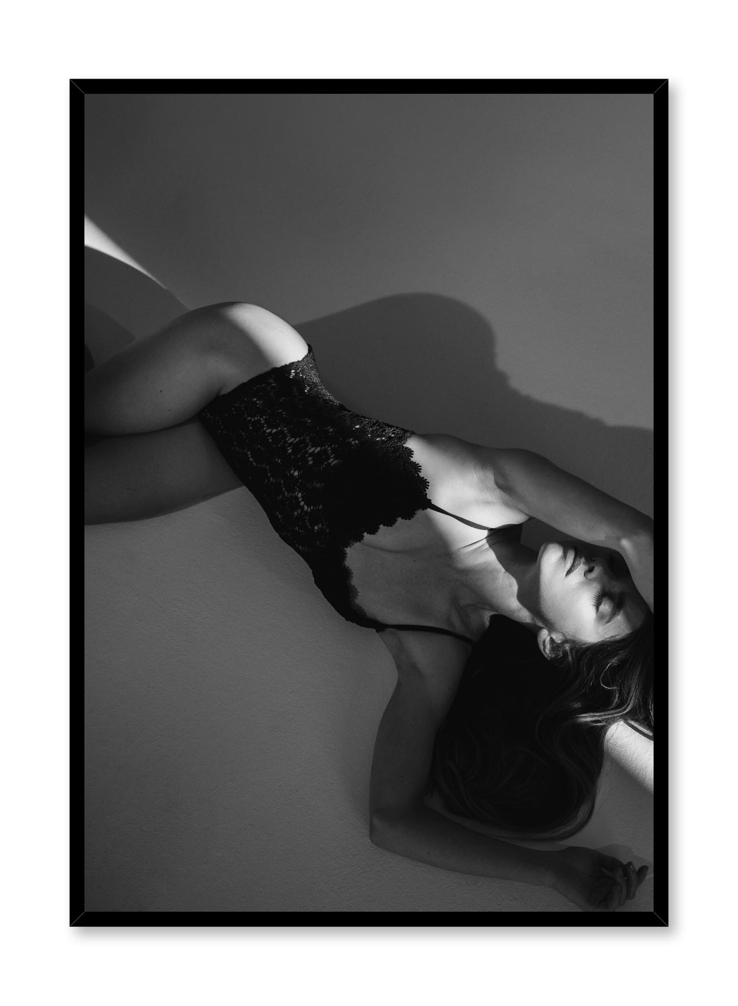 Black and white fashion photography poster by Opposite Wall with woman laying in lingerie