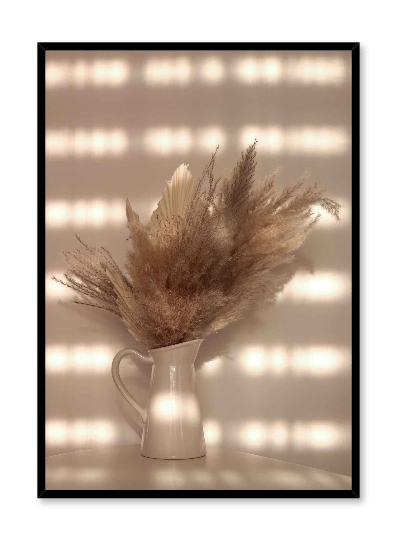 "Radiant Arrangement" is a botanical photography poster by Opposite Wall of a golden dried pampas bouquet in a white vase bathed in sunlight.