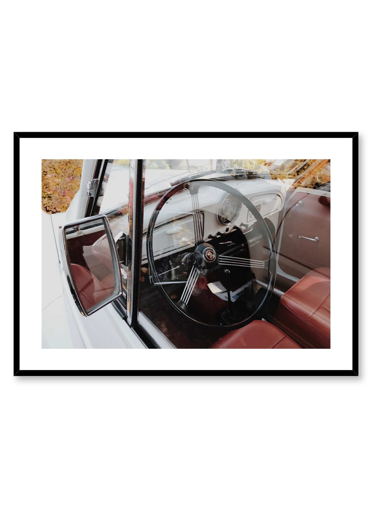 Cruisin’ is a car photography poster of the leather seat and large steering wheel of a 1950's car by Opposite Wall.
