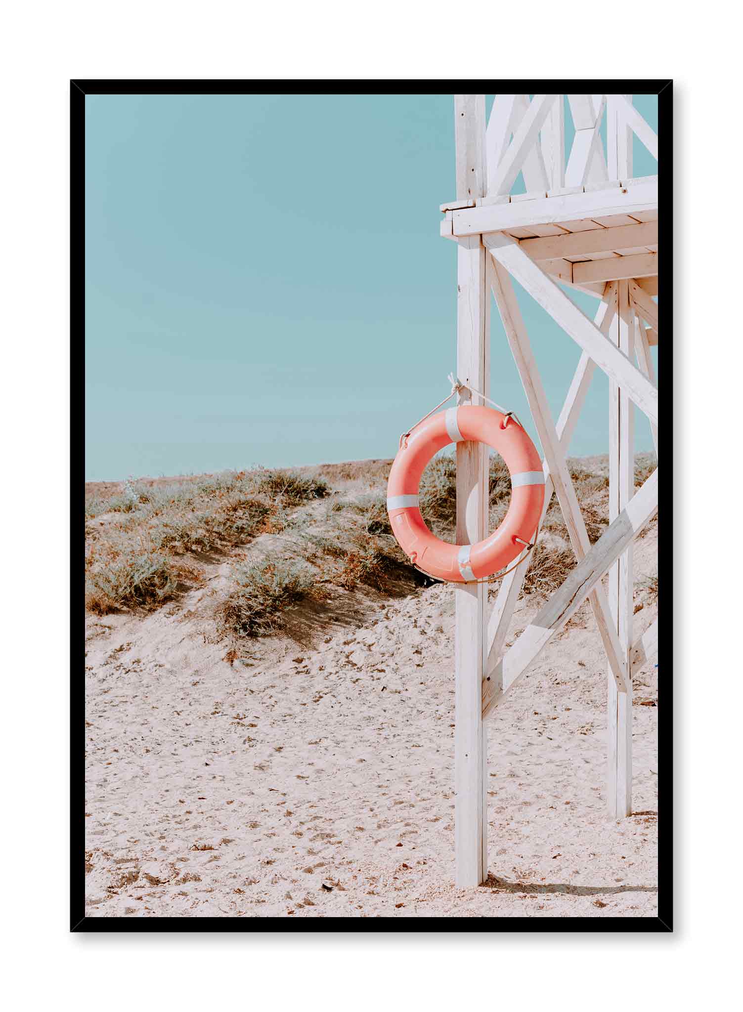 Safety First is a minimalist photography of a bright orange life ring hung on the pole of a lifeguard chair by Opposite Wall.