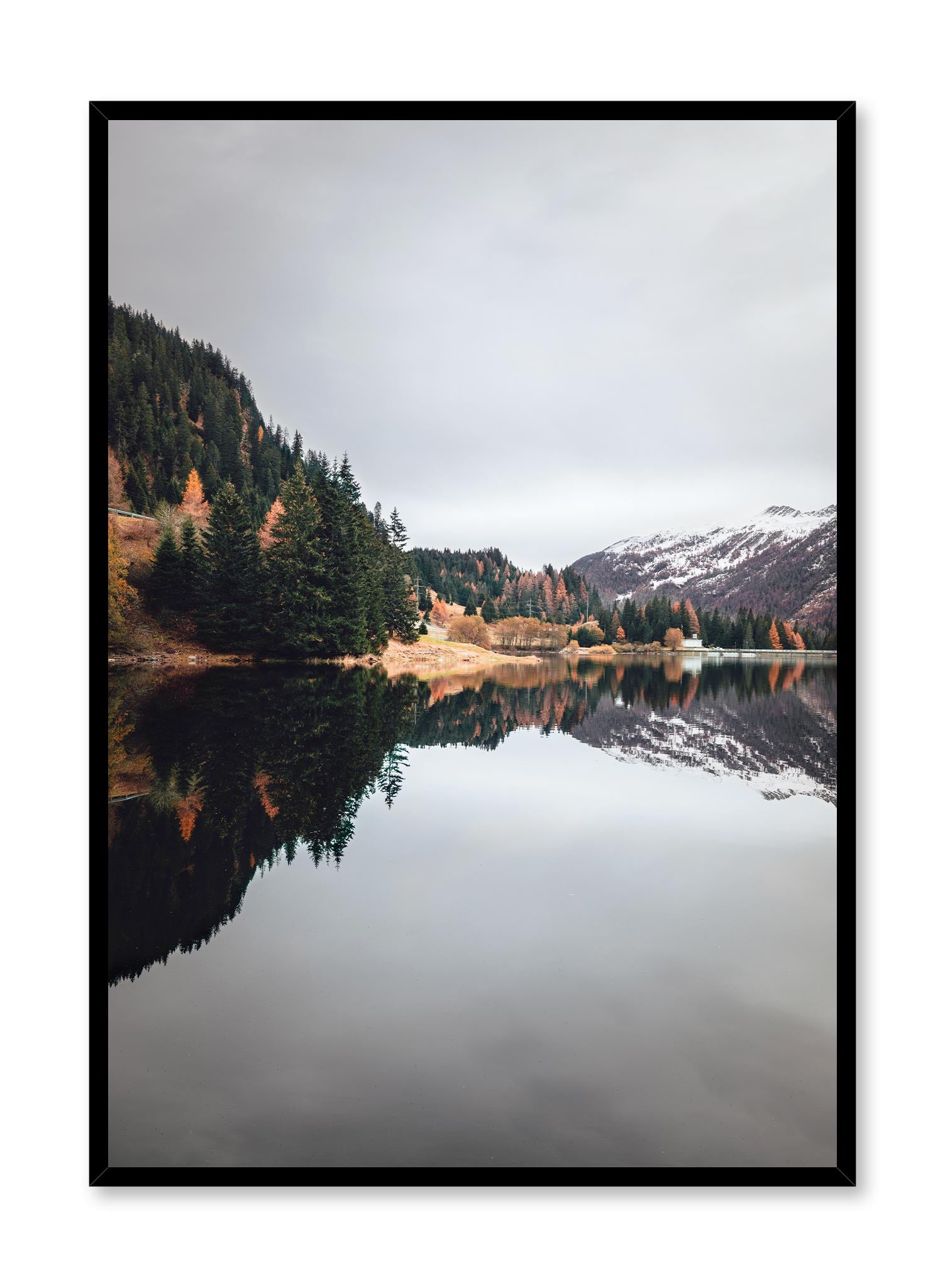 Peace & Quiet is a minimalist photography by Opposite Wall of the cloudy day view of one forest mountain and one snowy mountain mirrored over a river.