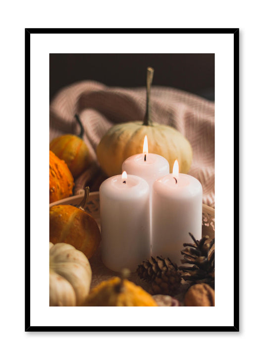 Candlelit is a minimalist photography by Opposite Wall of three lit candles surrounded by small pumpkins.